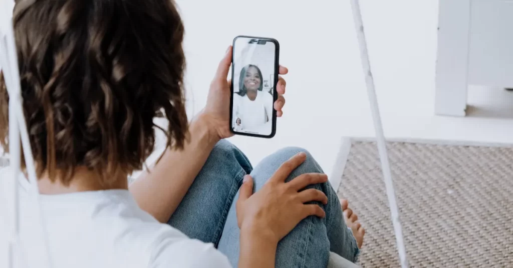 person using facetime on iphone